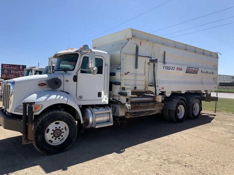 #74 2016 PETERBILT 4X6 348 TRUCK W / ROTO-MIX 1102-23 RDB FEEDER BOX